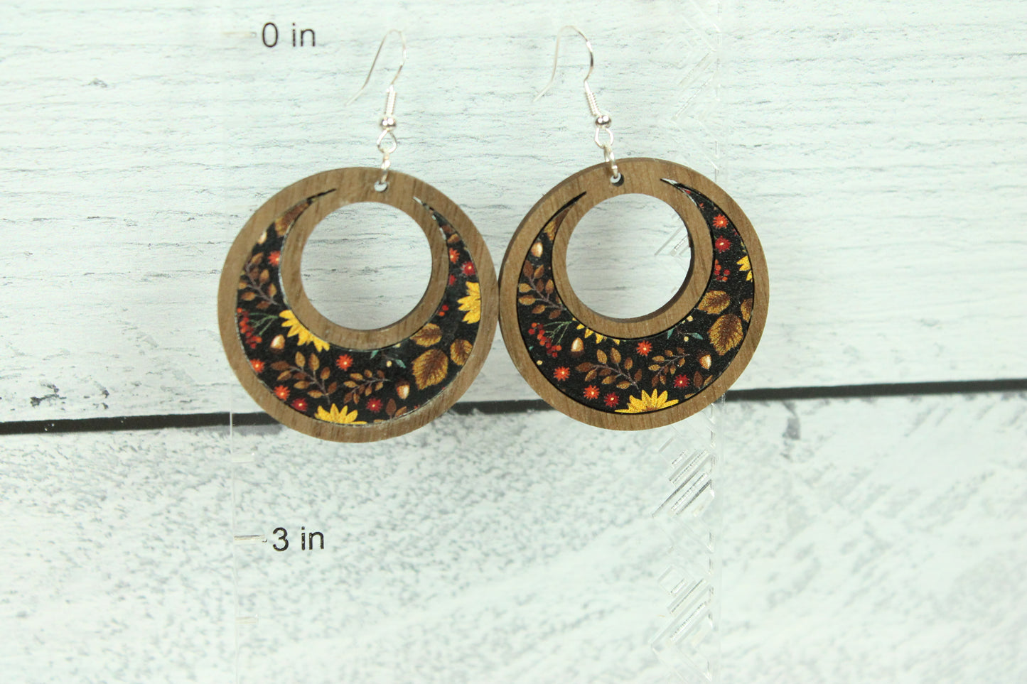 Fall dangle hoop earrings with leaf sunflowers design. Handmade cut from glowforge file. Wood frame acrylic plastic fall pattern look cute!